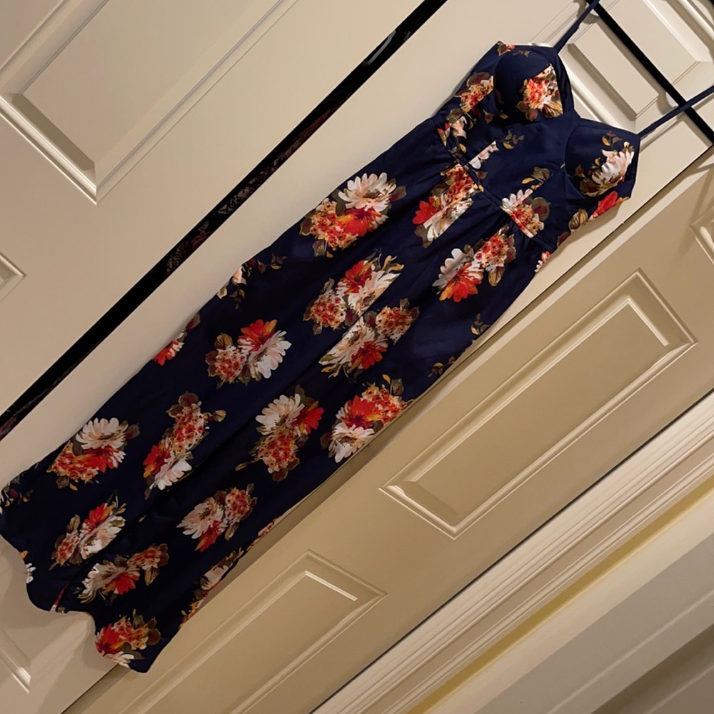 Floral long pant romper. Navy blue.